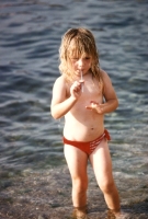 Beach girl with straw