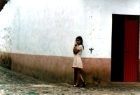 Girl by wall, Mexico